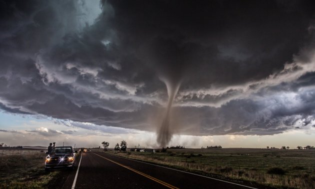 Overall winner: Tornado on show, Colorado: Tim Moxon A classic severe weather setup in the high plains of Colorado near the town of Wray yielded one of the most photogenic tornadoes of the year. We were just ahead of the storm as the tornado started and tracked with it as it grew from a fine funnel to a sizeable cone tornado. At this moment, the twister was at its most photogenic. We were among a number of people, including those you see in the shot, nervously enjoying the epic display nature put on for us.